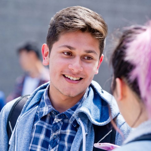 CCSF student talks to a peer